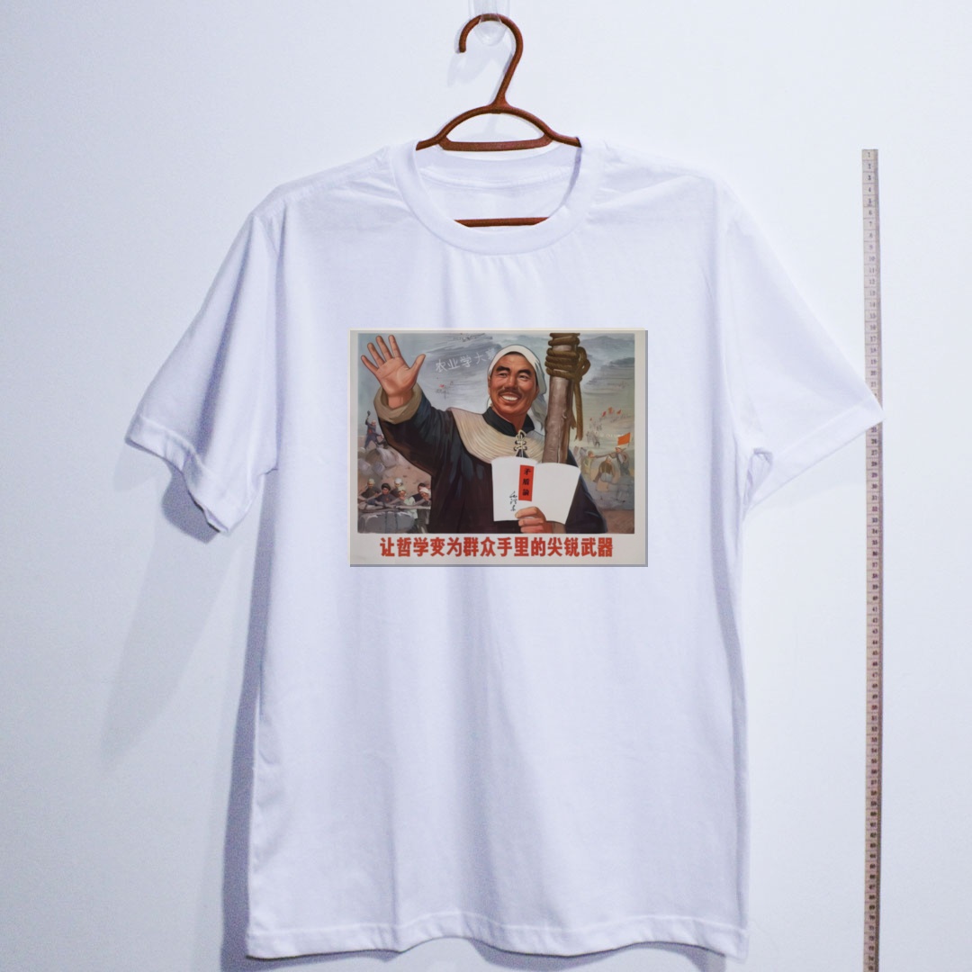 Camiseta_algodao_branco_que_isso_camarada_-_Transforme_a_filosofia_em_arma_afiada_nas_maos_das_massas | Transforme a filosofia em arma afiada nas mãos das massas