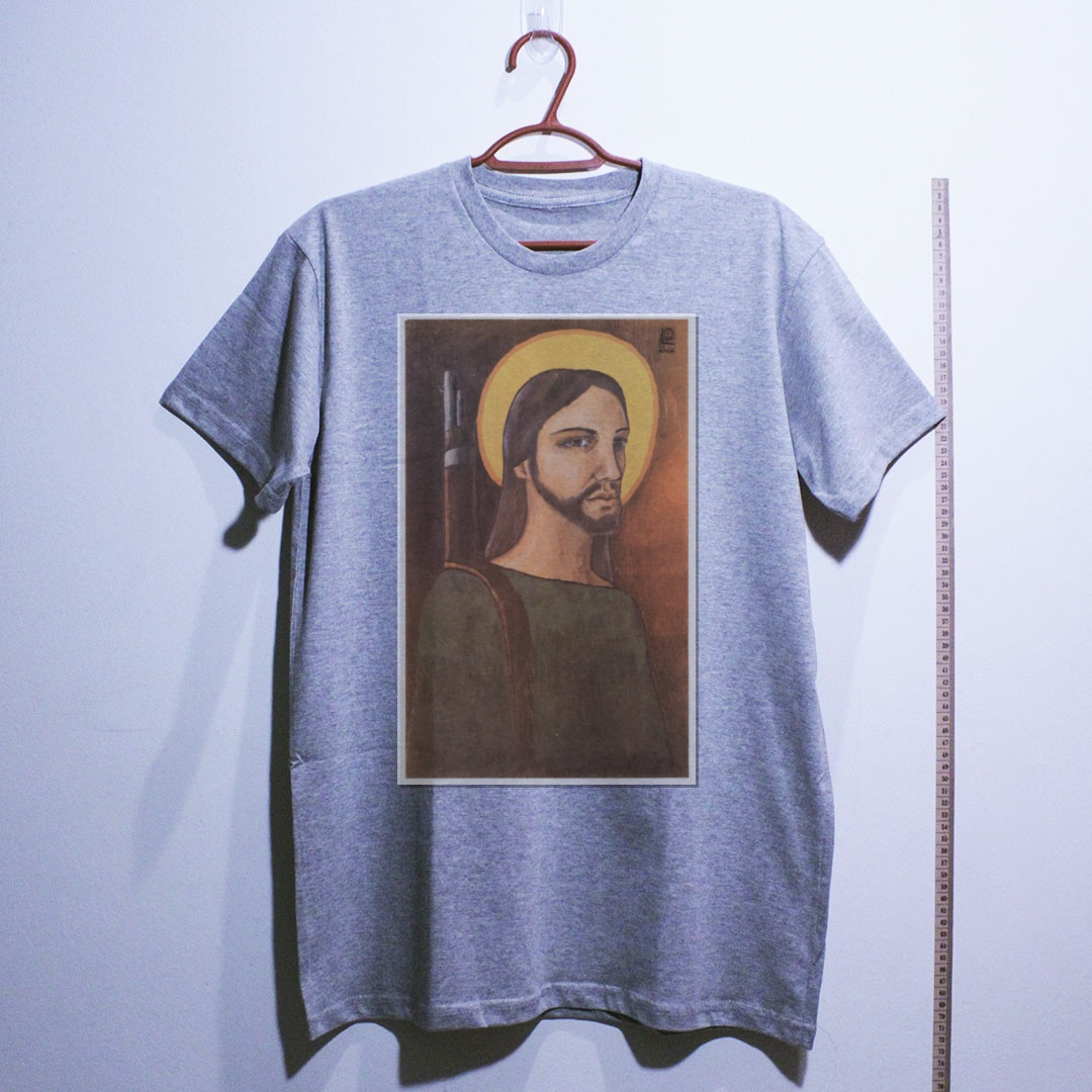 Camiseta_algodao_cinza_claro_que_isso_camarada_-_Cristo_guerrilheiro_-_Alfredo_Rostgaard_1969 | Cristo guerrilheiro - Alfredo Rostgaard 1969