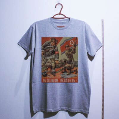 Camiseta_algodao_cinza_claro_que_isso_camarada_-_Resistir_a_America_apoiar_a_Coreia | Resistir à América, apoiar a Coreia