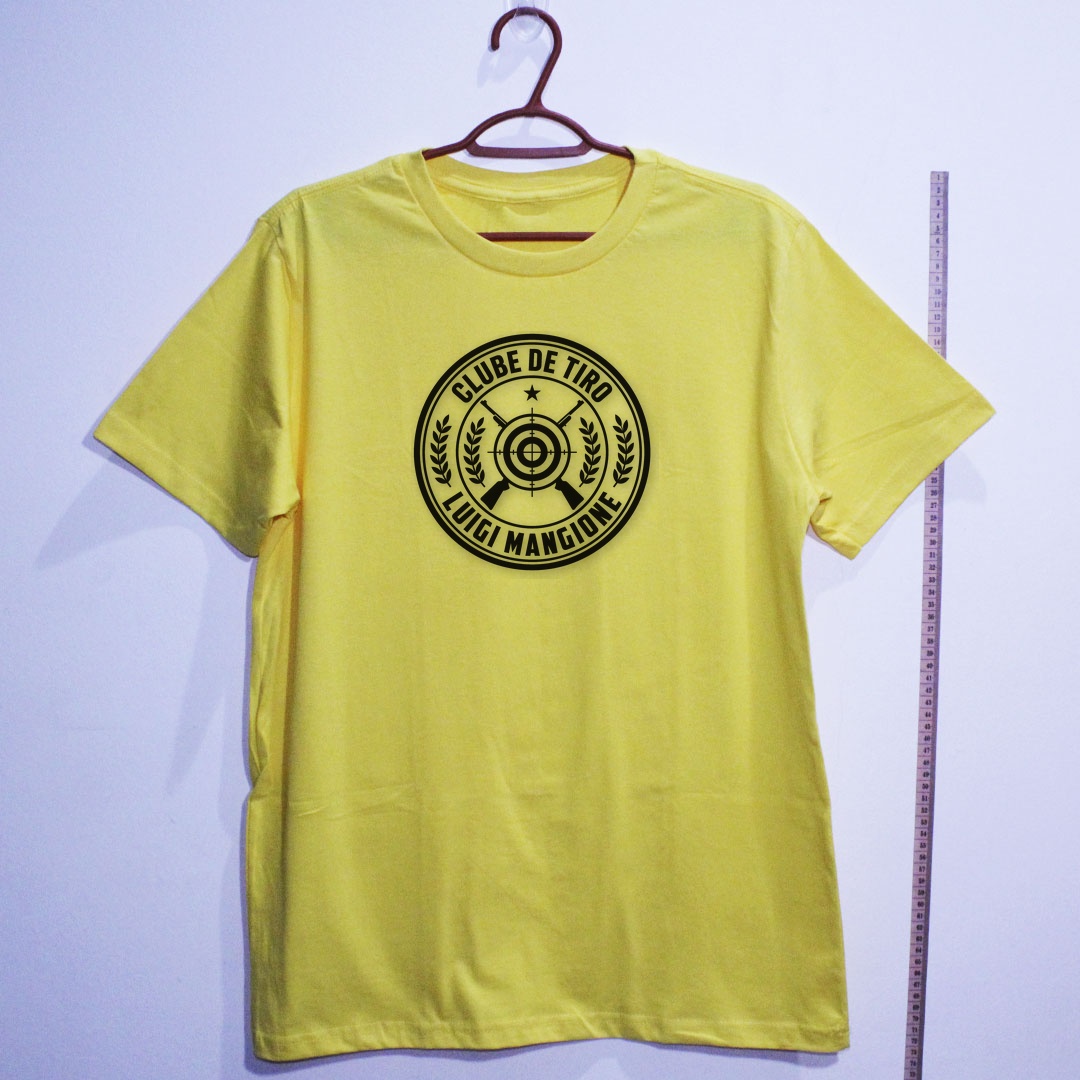 Camiseta_algodao_amarelo_que_isso_camarada_-_Clube_de_Tiro_Luigi_Mangione | Clube de Tiro Luigi Mangione