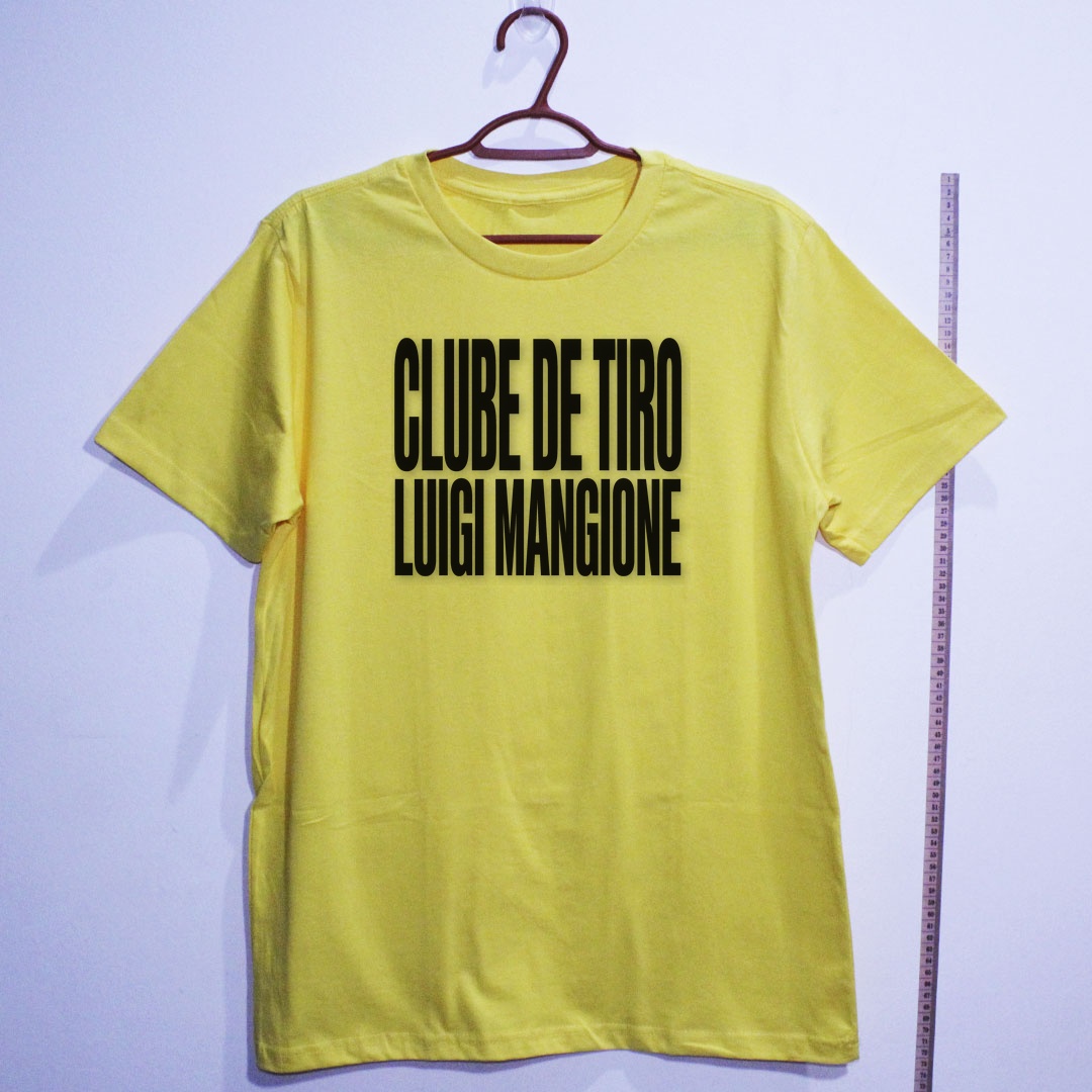 Camiseta_algodao_amarelo_que_isso_camarada_-_Clube_de_Tiro_Luigi_Mangione_-_Tipografia | Clube de Tiro Luigi Mangione - Tipografia